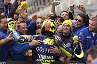 Rossi celebrates with Yamaha team